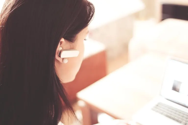 On-call staff member speaking calmly on the phone